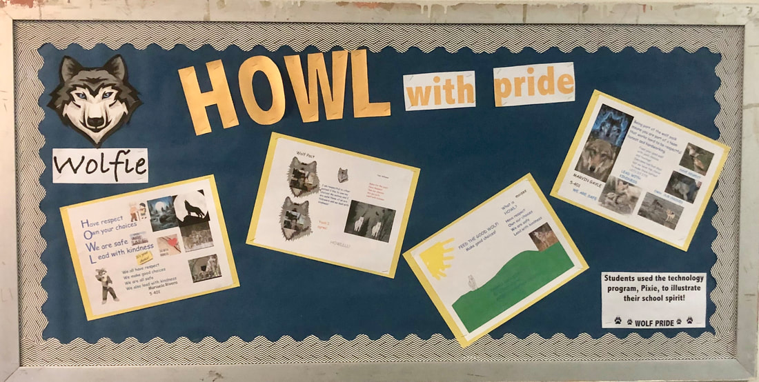 Hallway bulletin board explaining our core values and school mascot, Wolfie.